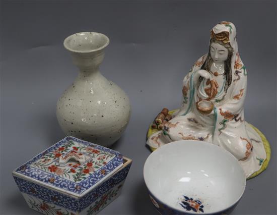 Japanese ceramics: a blue and white vase, a figure of Kwannon, an Imari bowl and a bottle vase, etc.